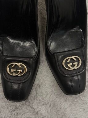 Gucci Black Leather Heeled Loafers with Gold Logo